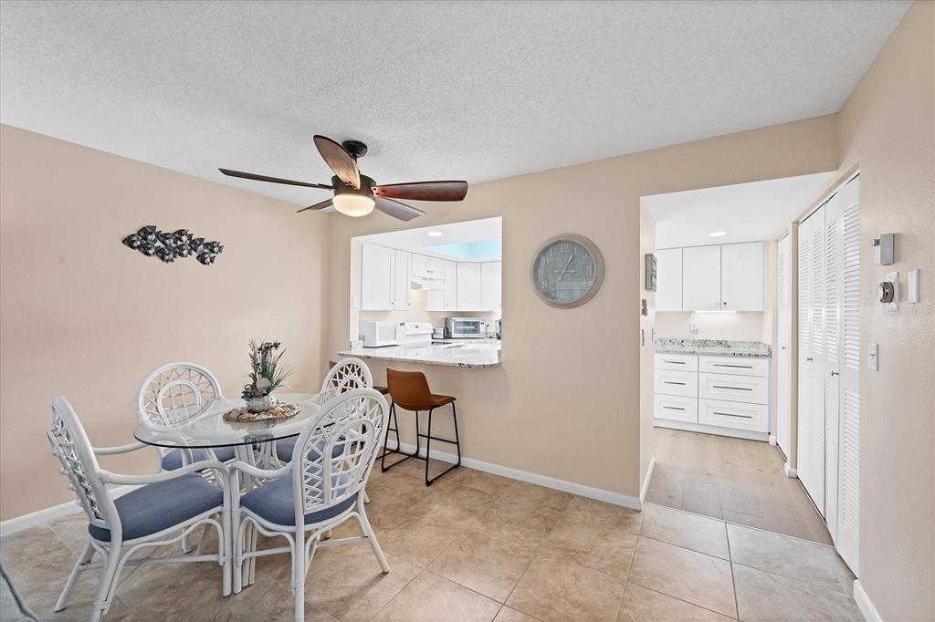 1531 Placida Road, Unit 4102 Englewood, FL 34223 - Photo 12 of 55 a view of a livingroom with furniture and a clock