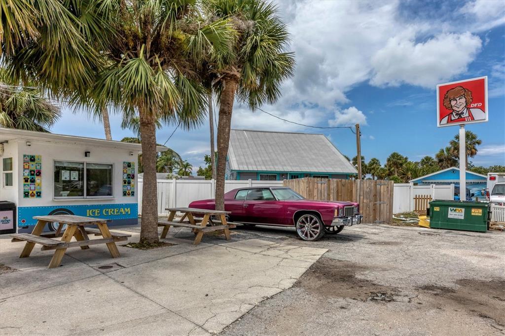1531 Placida Road, Unit 4102 Englewood, FL 34223 - Photo 52 of 55 a cars parked in front of a house