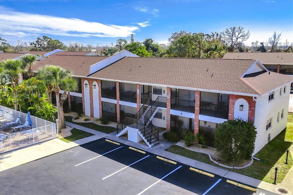 1531 Placida Road, Unit 4102 Englewood, FL 34223 - Photo 53 of 55 a aerial view of a house with swimming pool and furniture