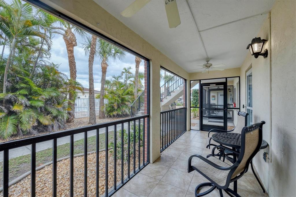 1531 Placida Road, Unit 4102 Englewood, FL 34223 - Photo 7 of 55 a living room with furniture and a window