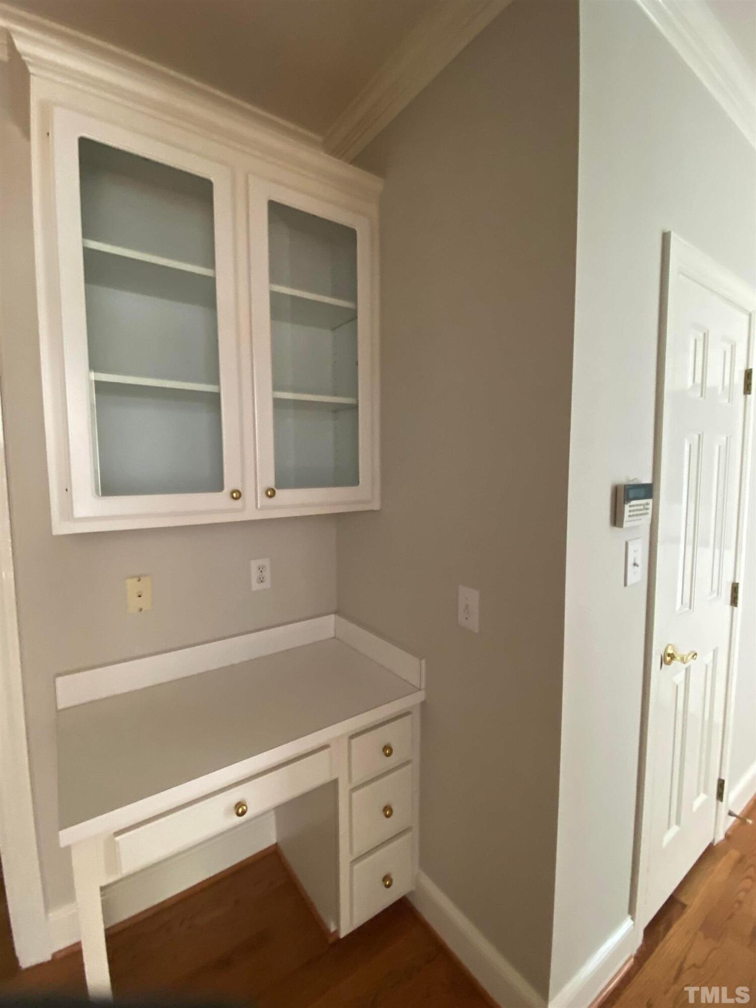 10621 Cahill Road Raleigh, NC 27614 - Photo 13 of 32 a view of an empty room with a window