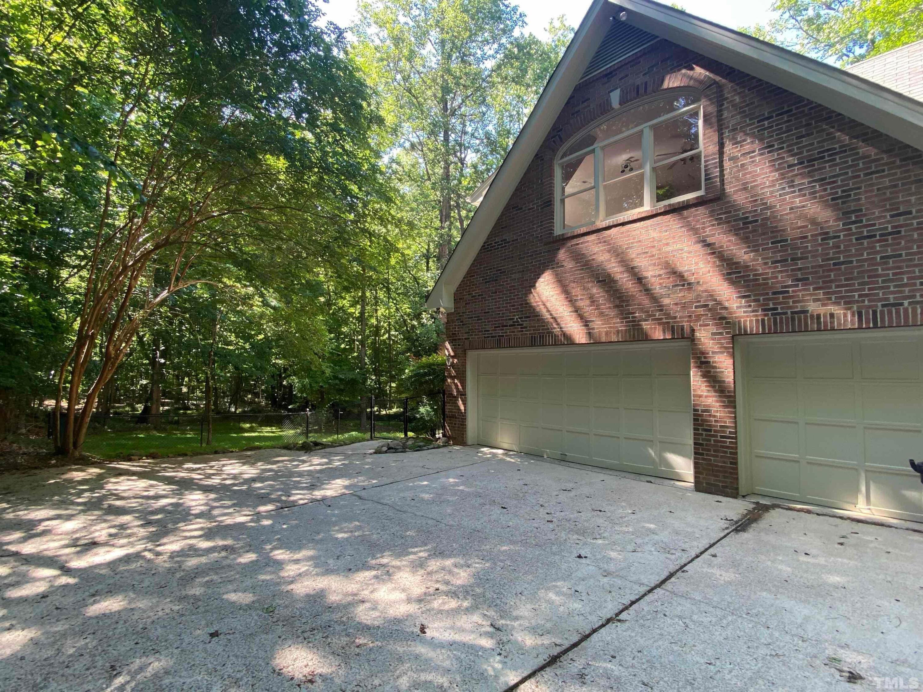 10621 Cahill Road Raleigh, NC 27614 - Photo 28 of 32 a front view of a house with a yard