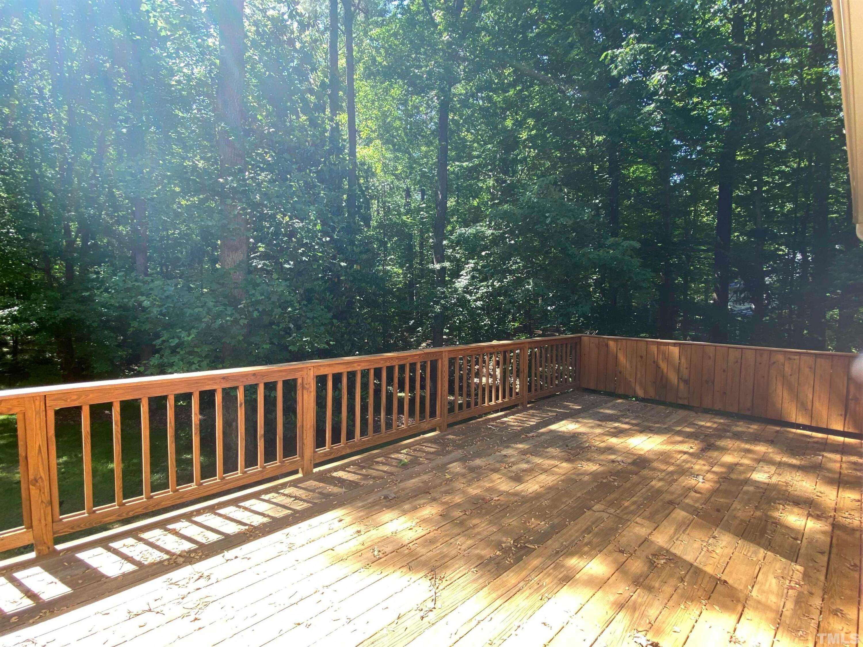 10621 Cahill Road Raleigh, NC 27614 - Photo 29 of 32 a view of a wooden deck