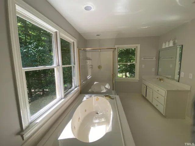 workspace with wooden floor and windows