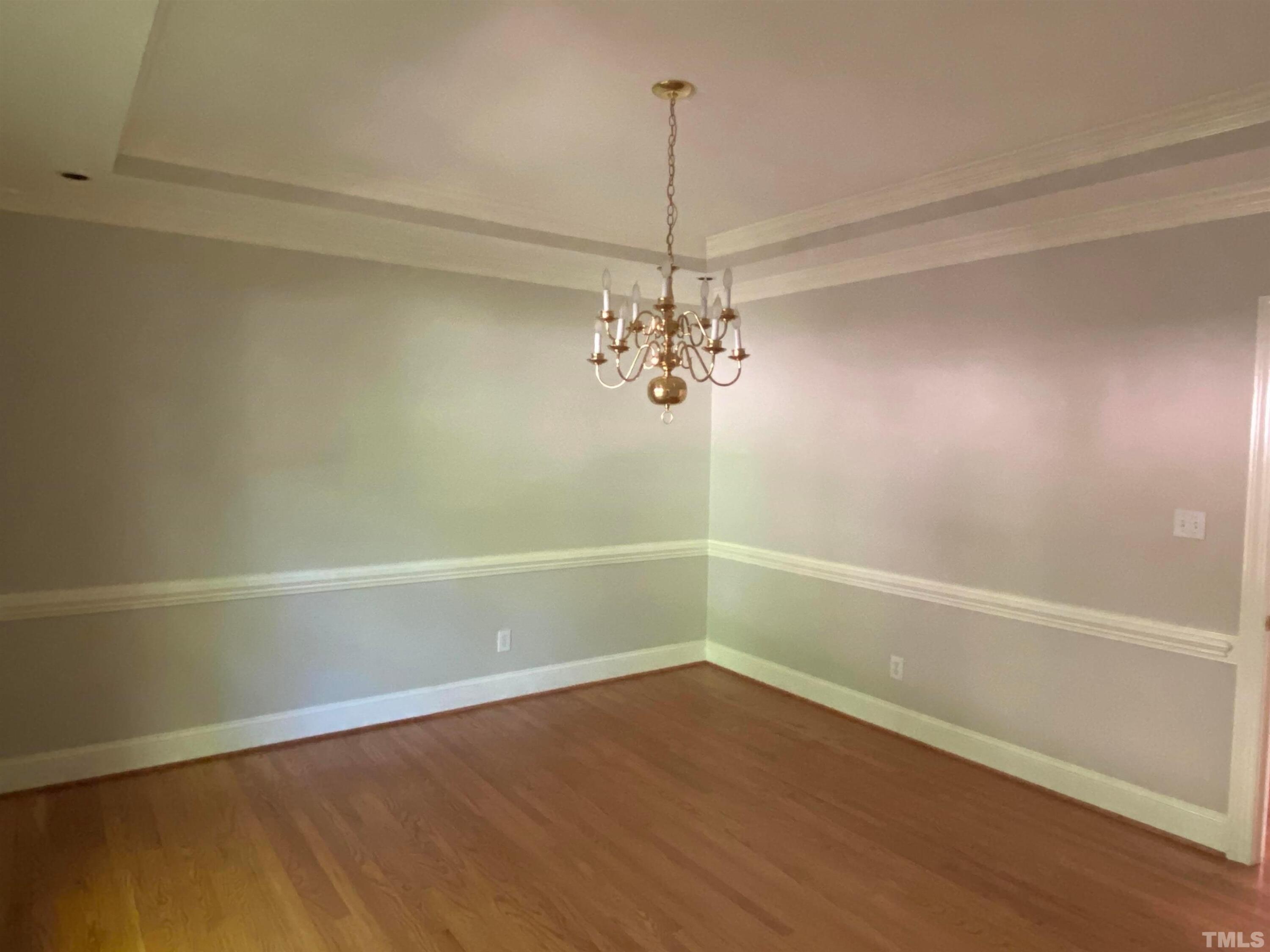 10621 Cahill Road Raleigh, NC 27614 - Photo 7 of 32 a view of a room with a window and wooden floor