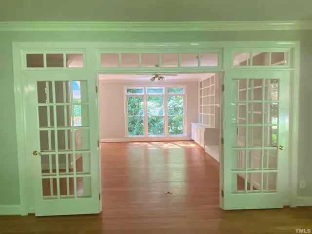a view of empty room with windows