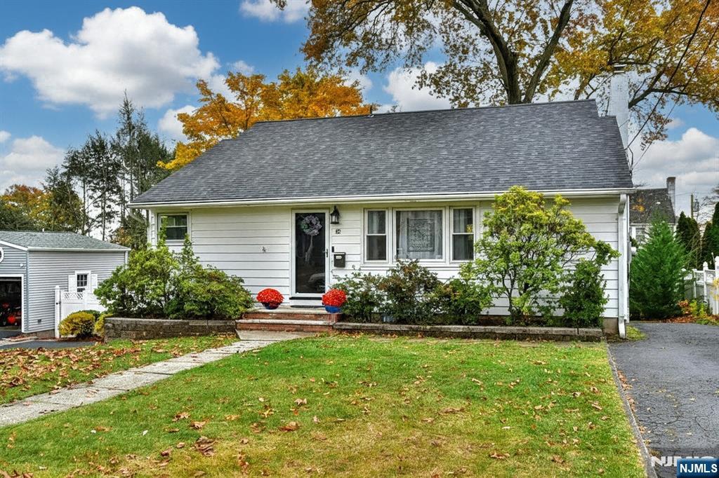 a front view of house with yard