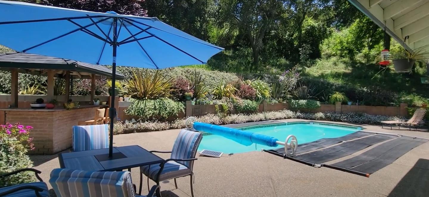 17752 Vierra Canyon Road Salinas, CA 93907 - Photo 13 of 31 a view of a swimming pool with a patio
