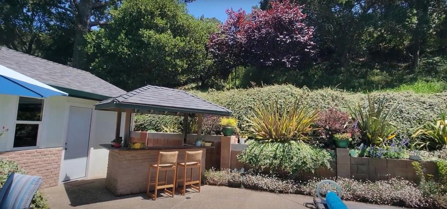 17752 Vierra Canyon Road Salinas, CA 93907 - Photo 14 of 31 a view of backyard with plants and outdoor seating