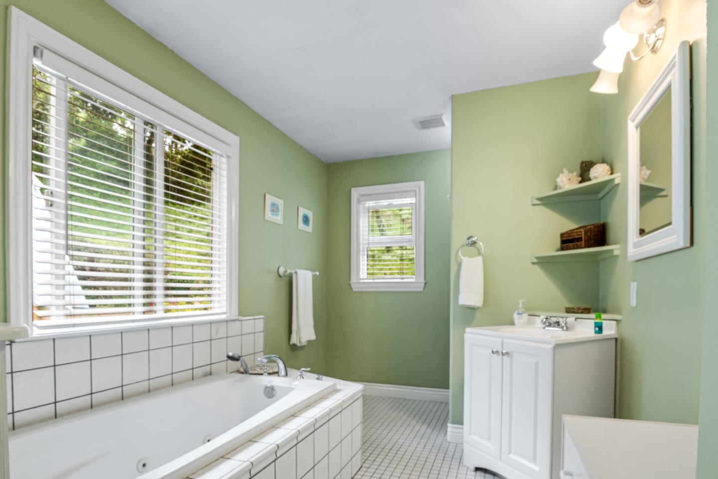 17752 Vierra Canyon Road Salinas, CA 93907 - Photo 23 of 31 a bathroom with a tub and a window