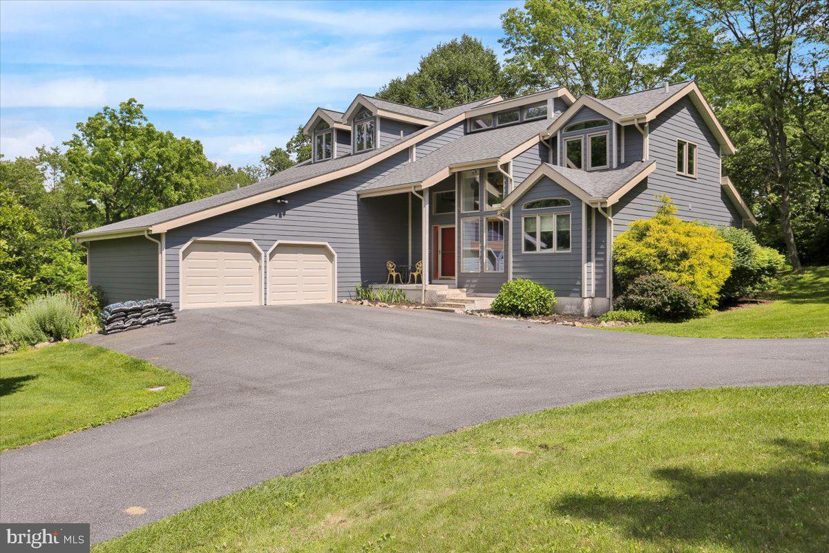 6 Sadowski Drive Reading, PA 19606 - Photo 2 of 66 a front view of a house with garden