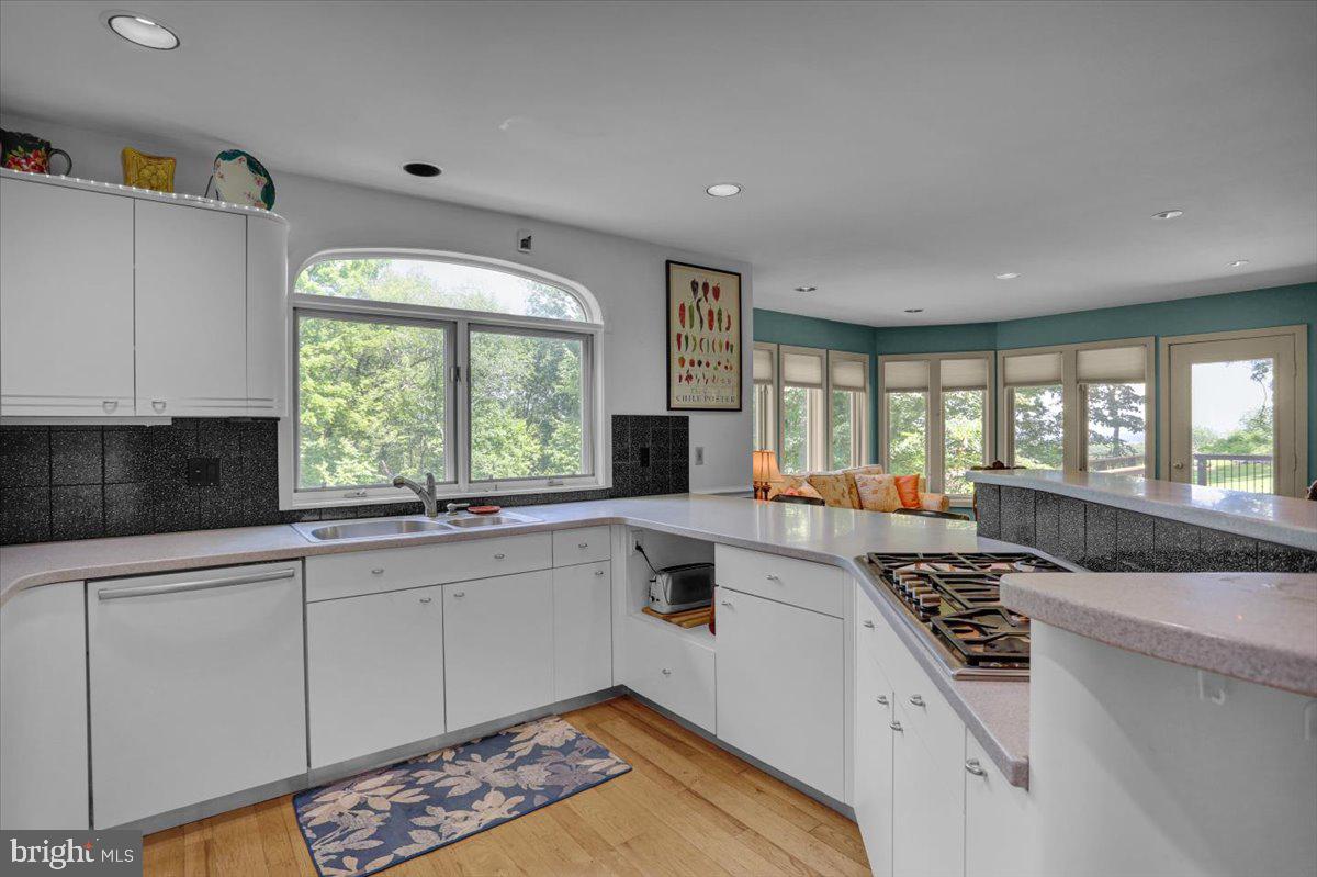 6 Sadowski Drive Reading, PA 19606 - Photo 21 of 66 a kitchen with stainless steel appliances granite countertop a stove a sink and a microwave