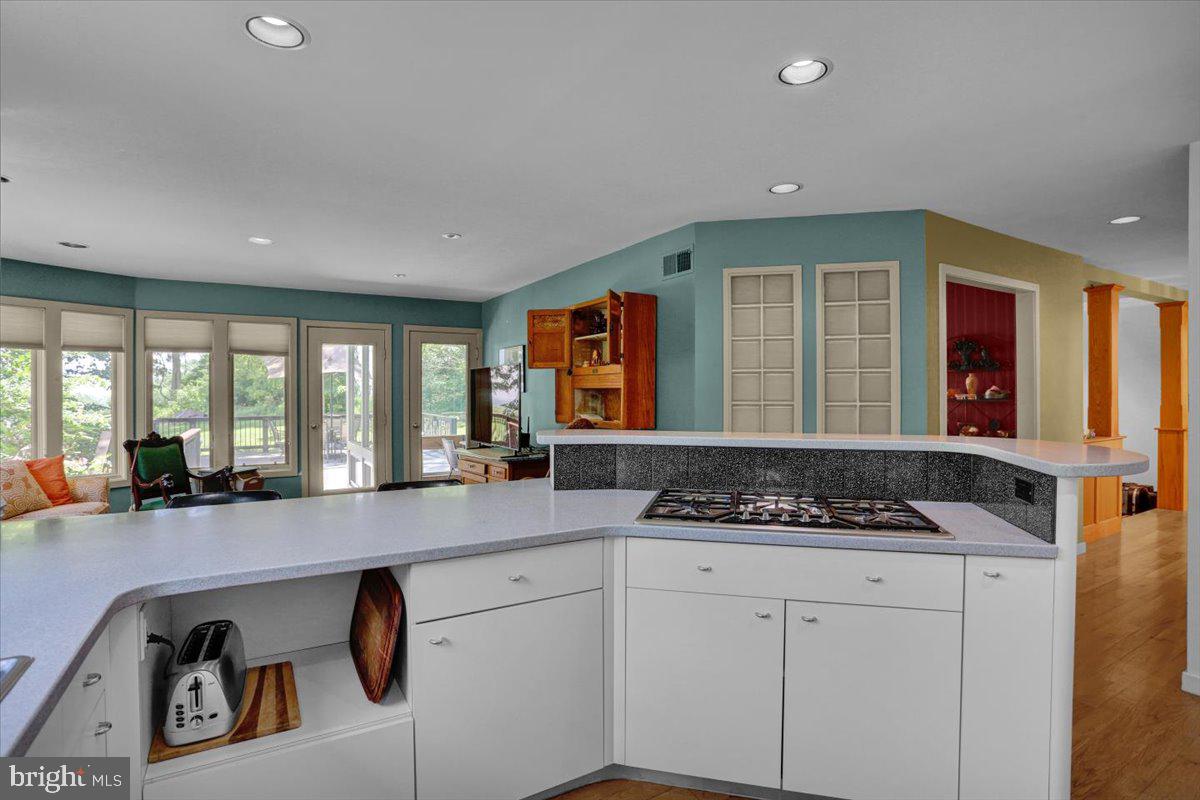 6 Sadowski Drive Reading, PA 19606 - Photo 23 of 66 a kitchen with stainless steel appliances granite countertop a stove a sink and a granite counter tops with white cabinets