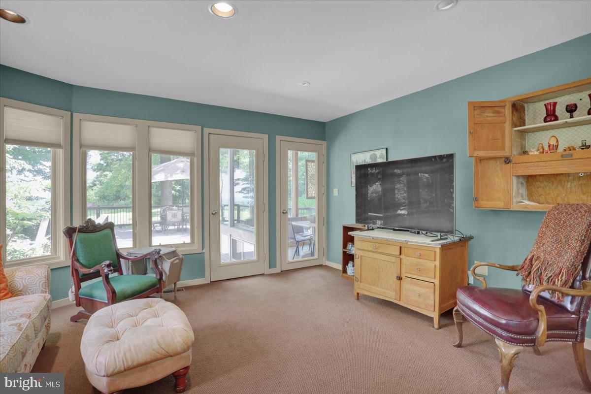 6 Sadowski Drive Reading, PA 19606 - Photo 26 of 66 a living room with furniture and a flat screen tv