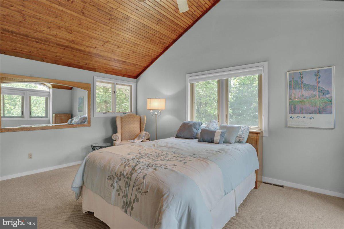 6 Sadowski Drive Reading, PA 19606 - Photo 29 of 66 a bedroom with a large bed and wooden floor