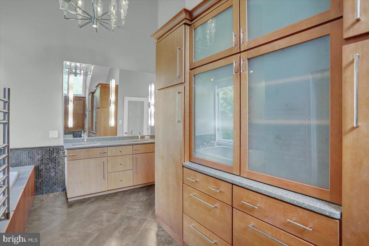6 Sadowski Drive Reading, PA 19606 - Photo 34 of 66 a bathroom with a granite countertop sink a mirror and a shower
