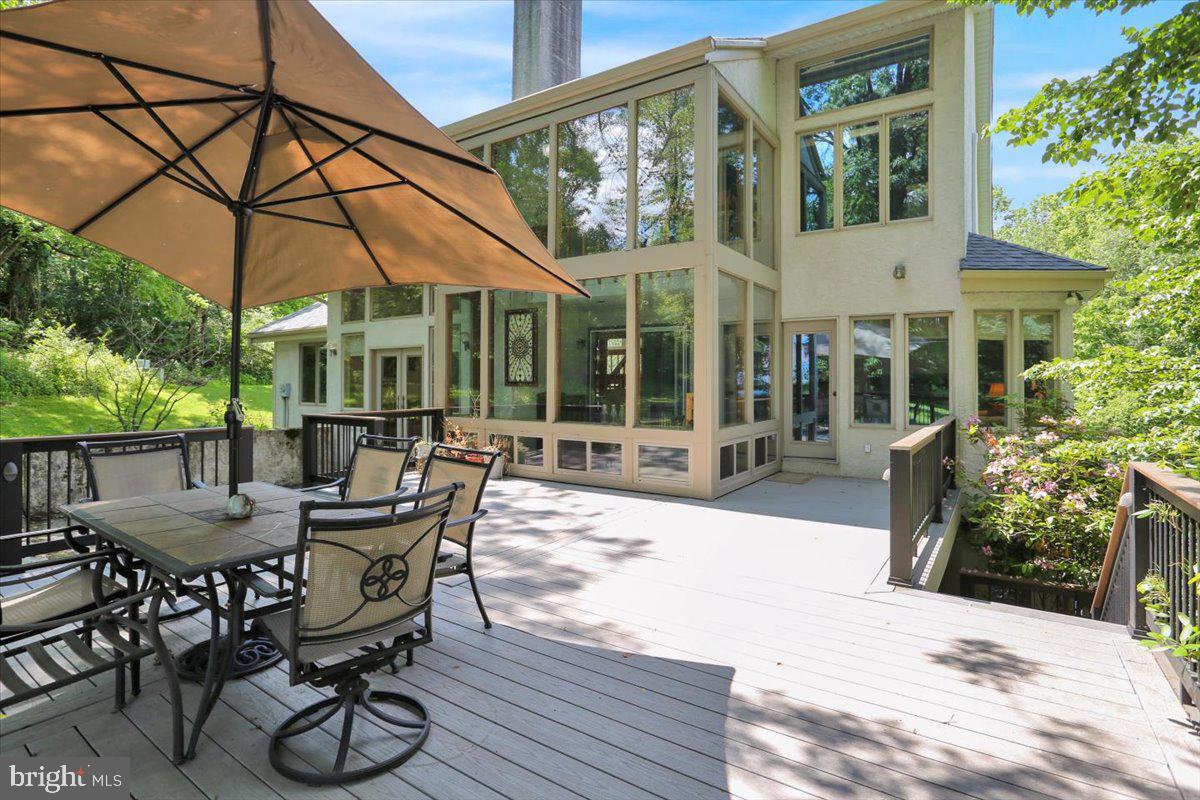 6 Sadowski Drive Reading, PA 19606 - Photo 59 of 66 a patio with a table and chairs and potted plants