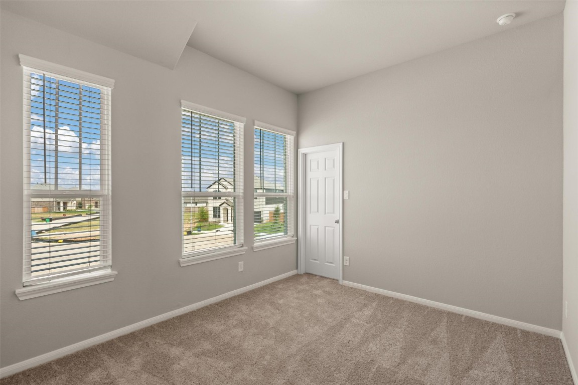 313 Redbud Rdg Drive Brookshire, TX 77423 - Photo 18 of 32 a view of an empty room with a window