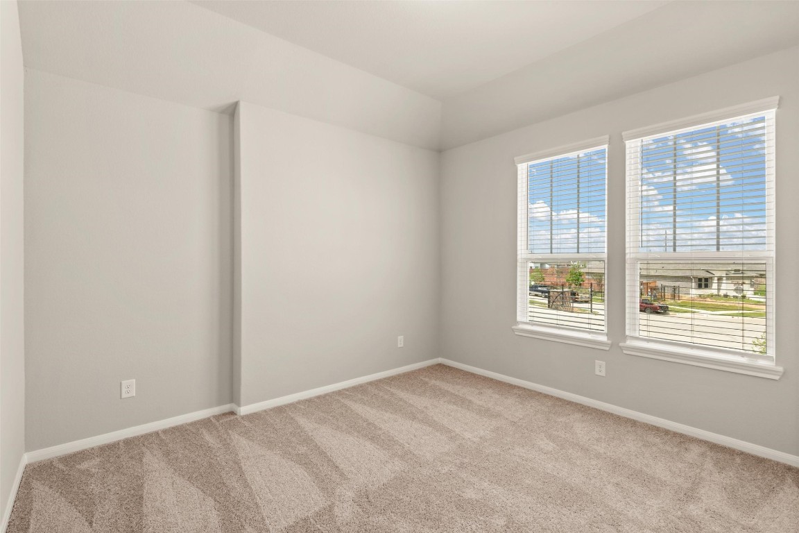 313 Redbud Rdg Drive Brookshire, TX 77423 - Photo 20 of 32 a view of an empty room with a window
