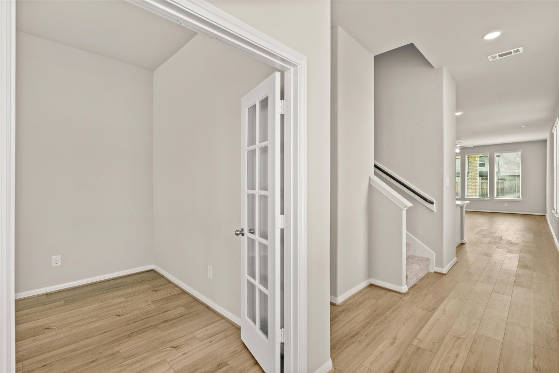 313 Redbud Rdg Drive Brookshire, TX 77423 - Photo 2 of 32 a view of a hallway with wooden floor and entryway