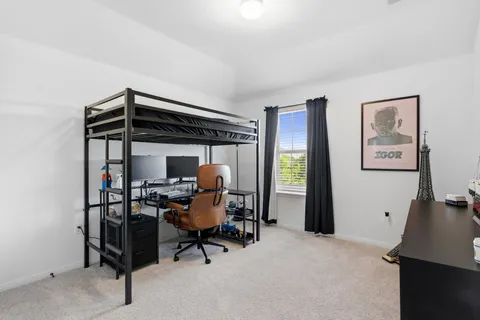 a view of a workspace with furniture