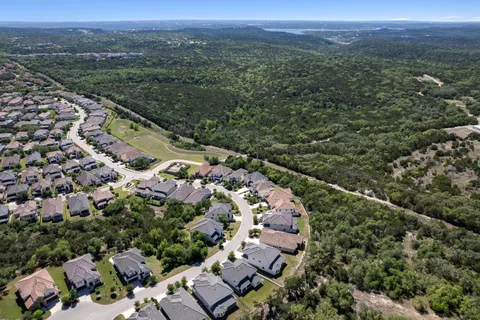 an aerial view of a city with lots of residential buildings