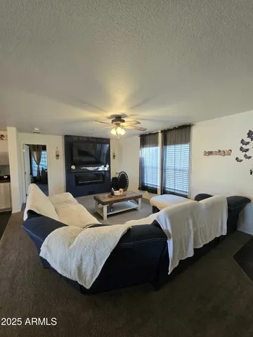 a bed room with bed and a tv