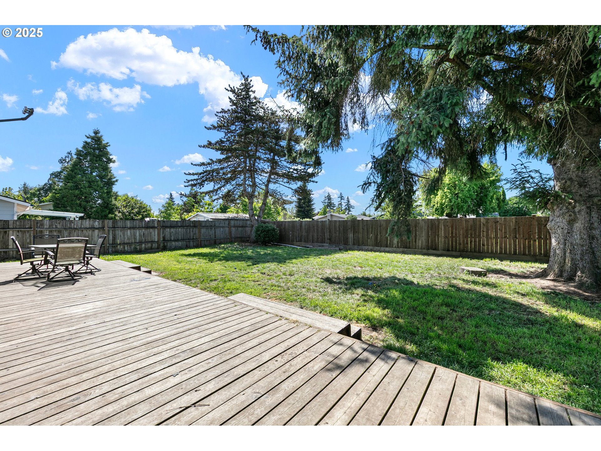 1221 Kenray Loop Springfield, OR 97477 - Photo 17 of 19 a view of backyard with wooden fence