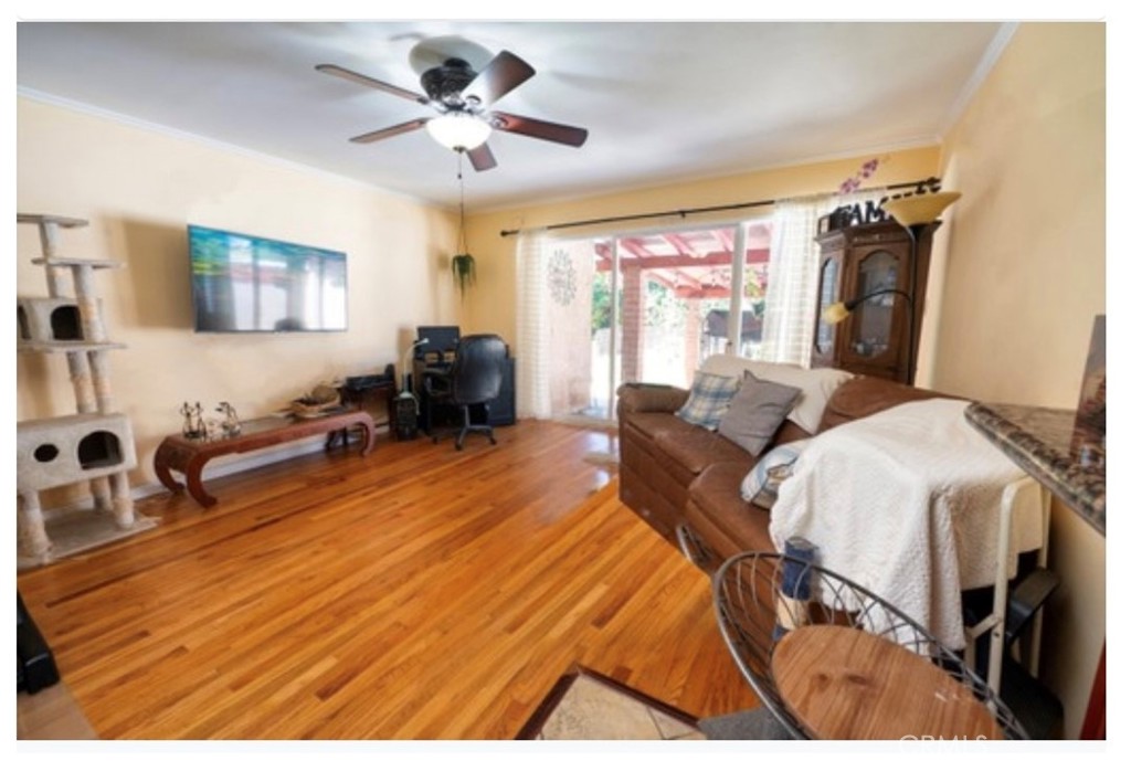 832 Frankel Avenue Montebello, CA 90640 - Photo 7 of 11 a living room with furniture and a flat screen tv