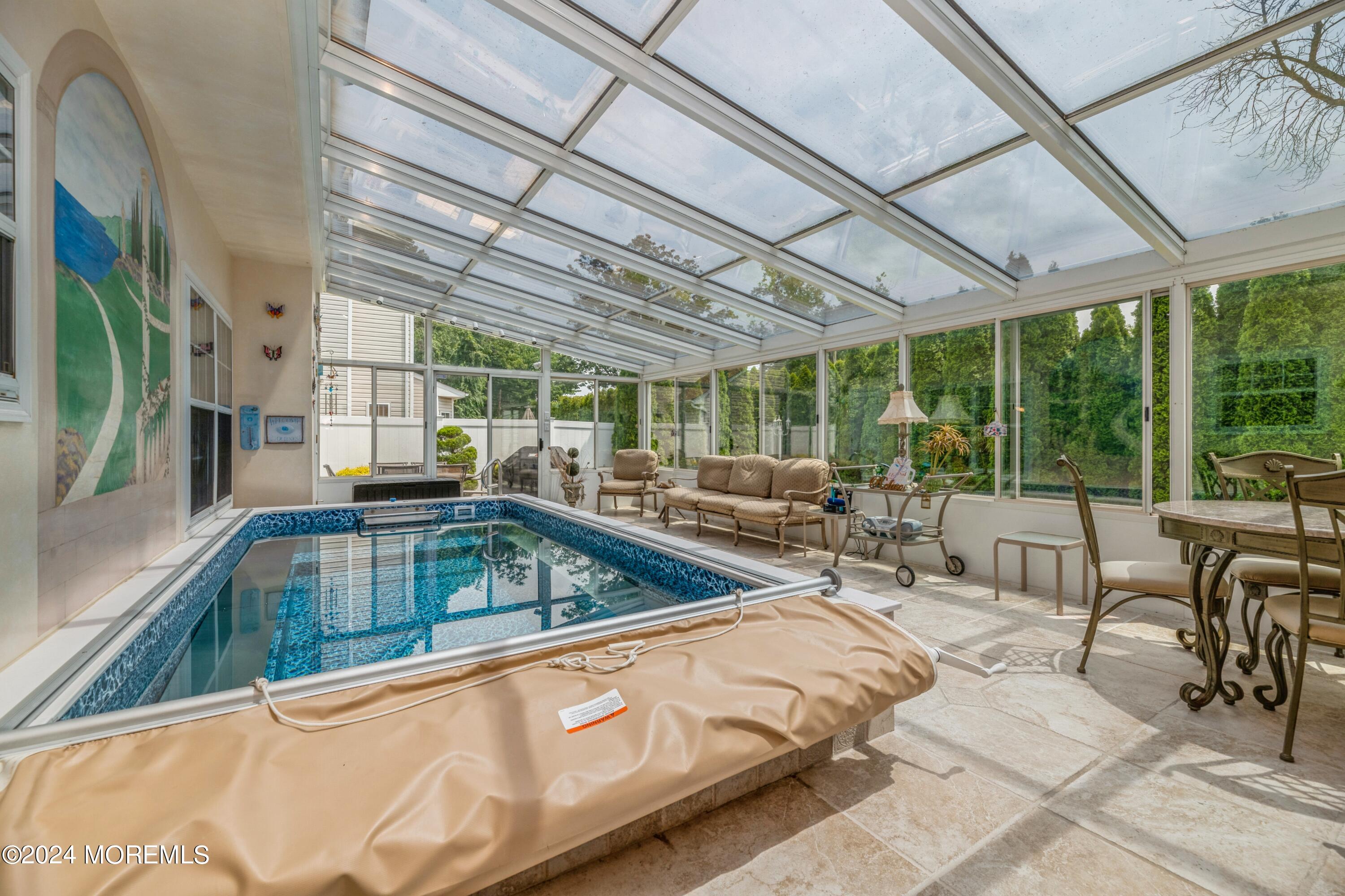 95 Nutmeg Road Aberdeen, NJ 07747 - Photo 17 of 21 a very nice looking room with a large window