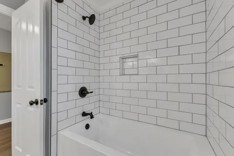 a bathroom with a bathtub