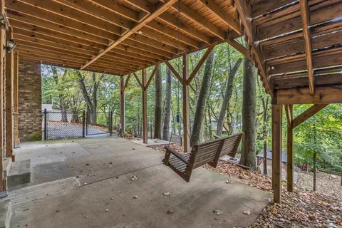 a view of porch with outdoor seating