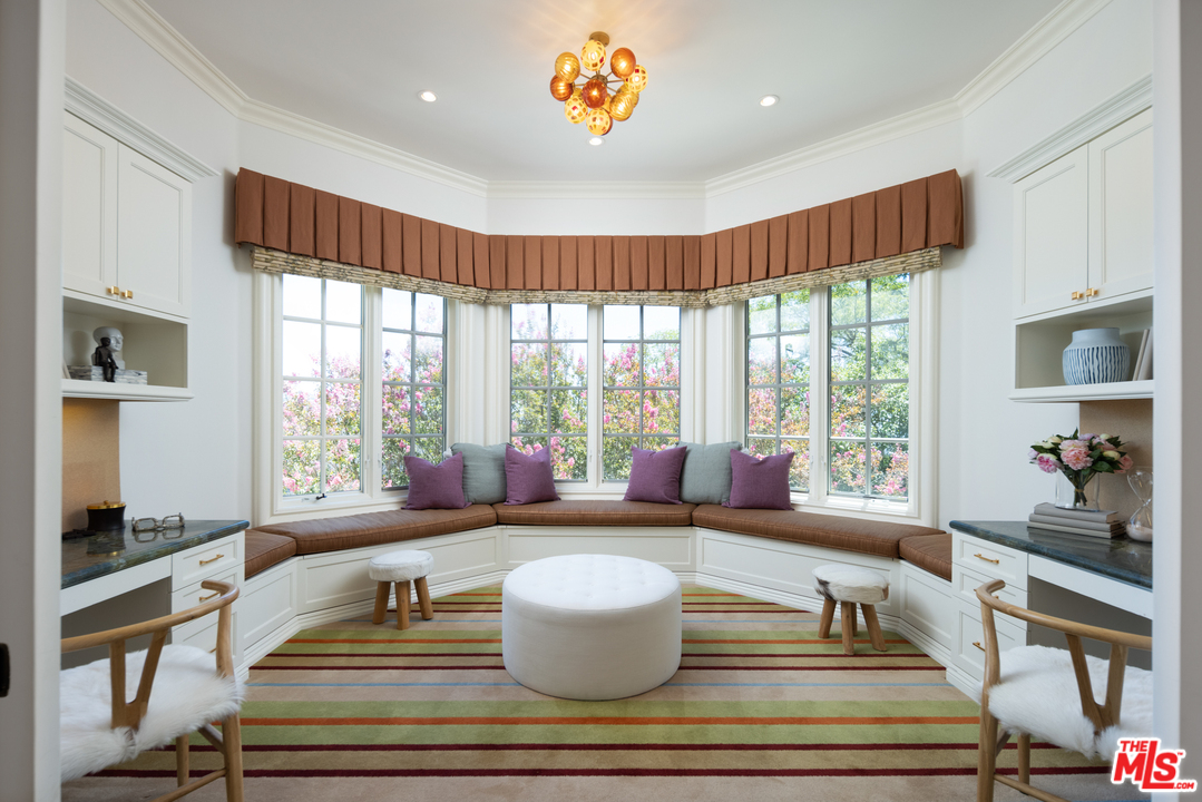 10 Beverly Park Beverly Hills, CA 90210 - Photo 23 of 33 a living room with furniture and a large window