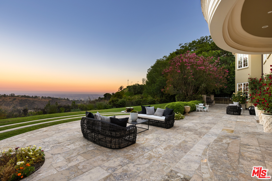 10 Beverly Park Beverly Hills, CA 90210 - Photo 5 of 33 a view of a couches in patio of the house