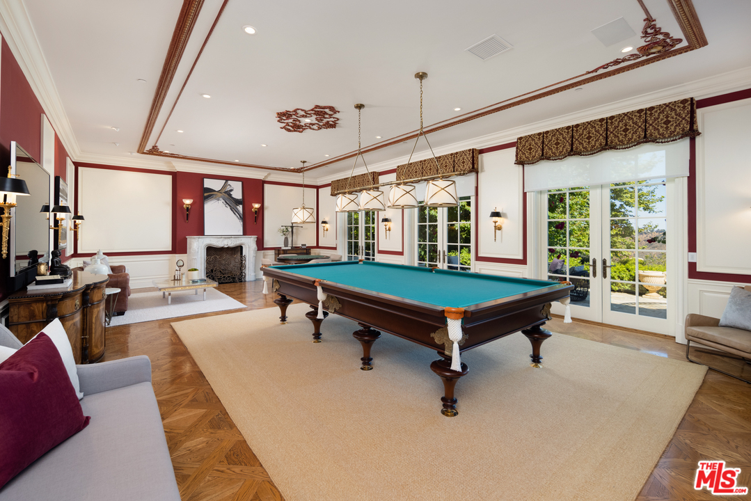 10 Beverly Park Beverly Hills, CA 90210 - Photo 7 of 33 a room with pool pool table and windows
