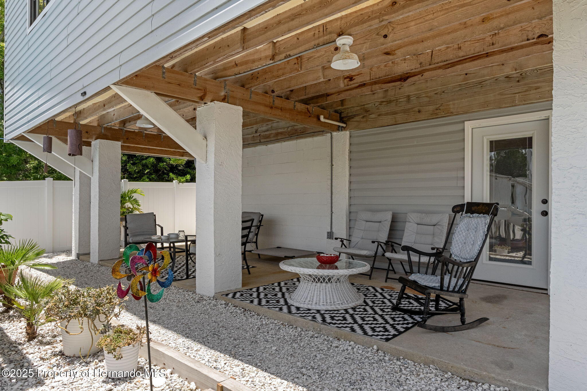 3216 Sea Grape Drive Hernando Beach, FL 34607 - Photo 31 of 39 Covered Back Porch