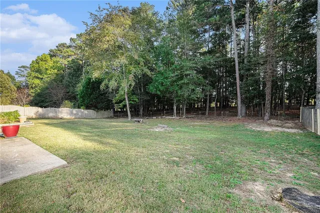 a view of a backyard with a trees