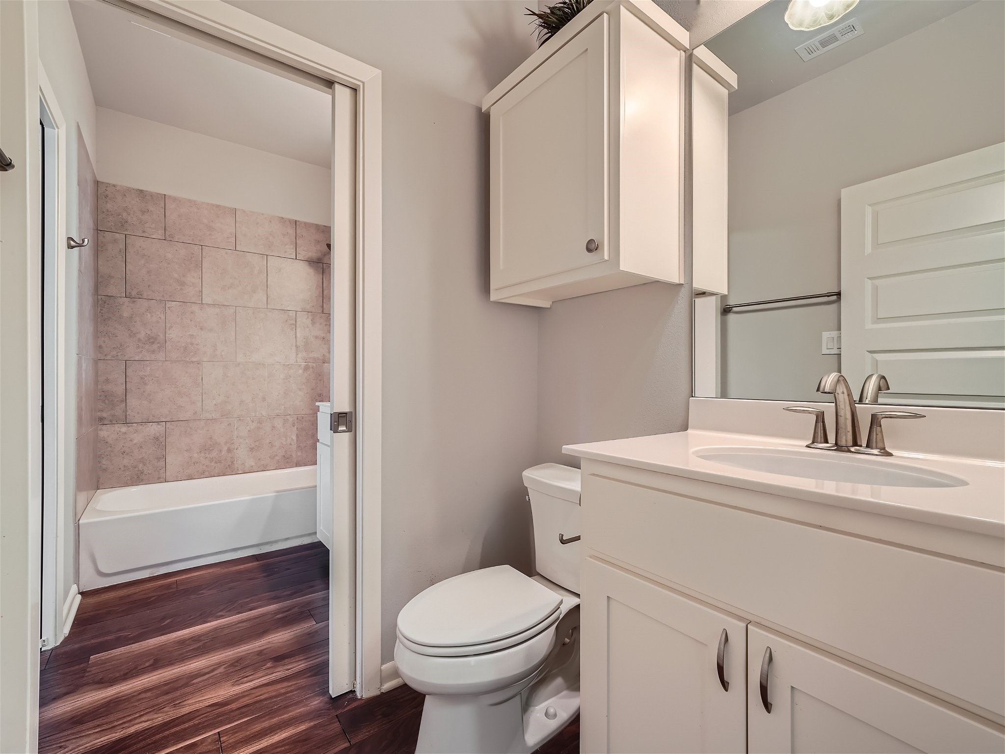 507 Venture Boulevard South Point Venture, TX 78645 - Photo 7 of 31 a bathroom with a sink toilet and shower
