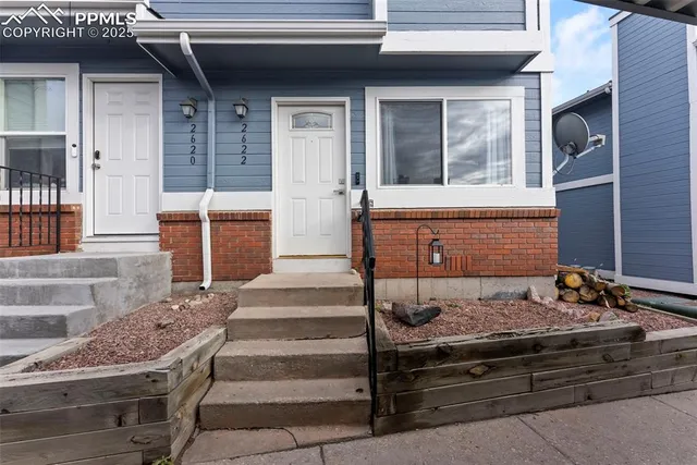 a front view of a house with windows