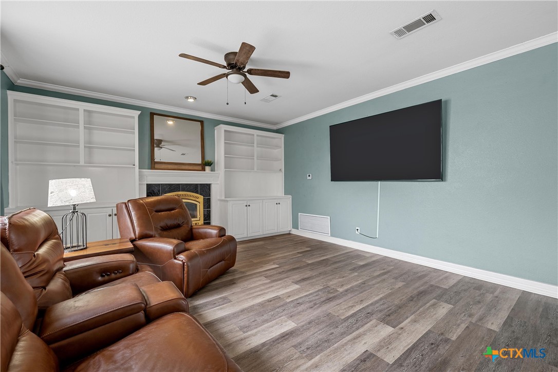 3891 Highway 53 Temple, TX 76501 - Photo 17 of 45 second living area with built in bookshelves