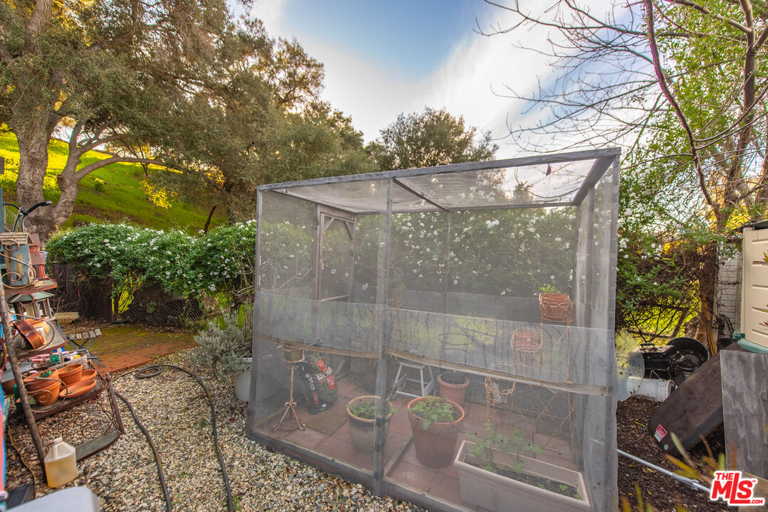 1667 Las Virgenes Canyon Road, Unit 5 Calabasas, CA 91302 - Photo 29 of 36 a view of a pathway of a house