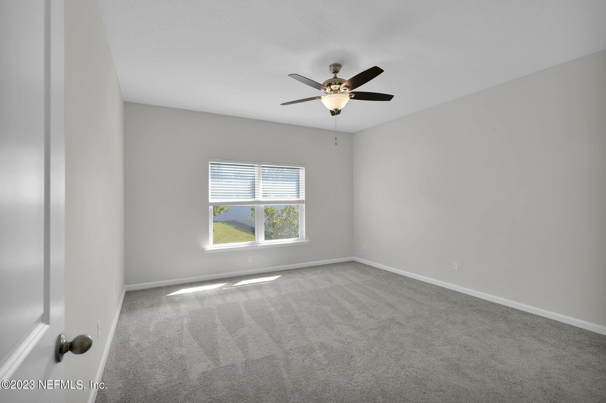 3513 Butternut Way Orange Park, FL 32065 - Photo 17 of 38 a view of an empty room with a window