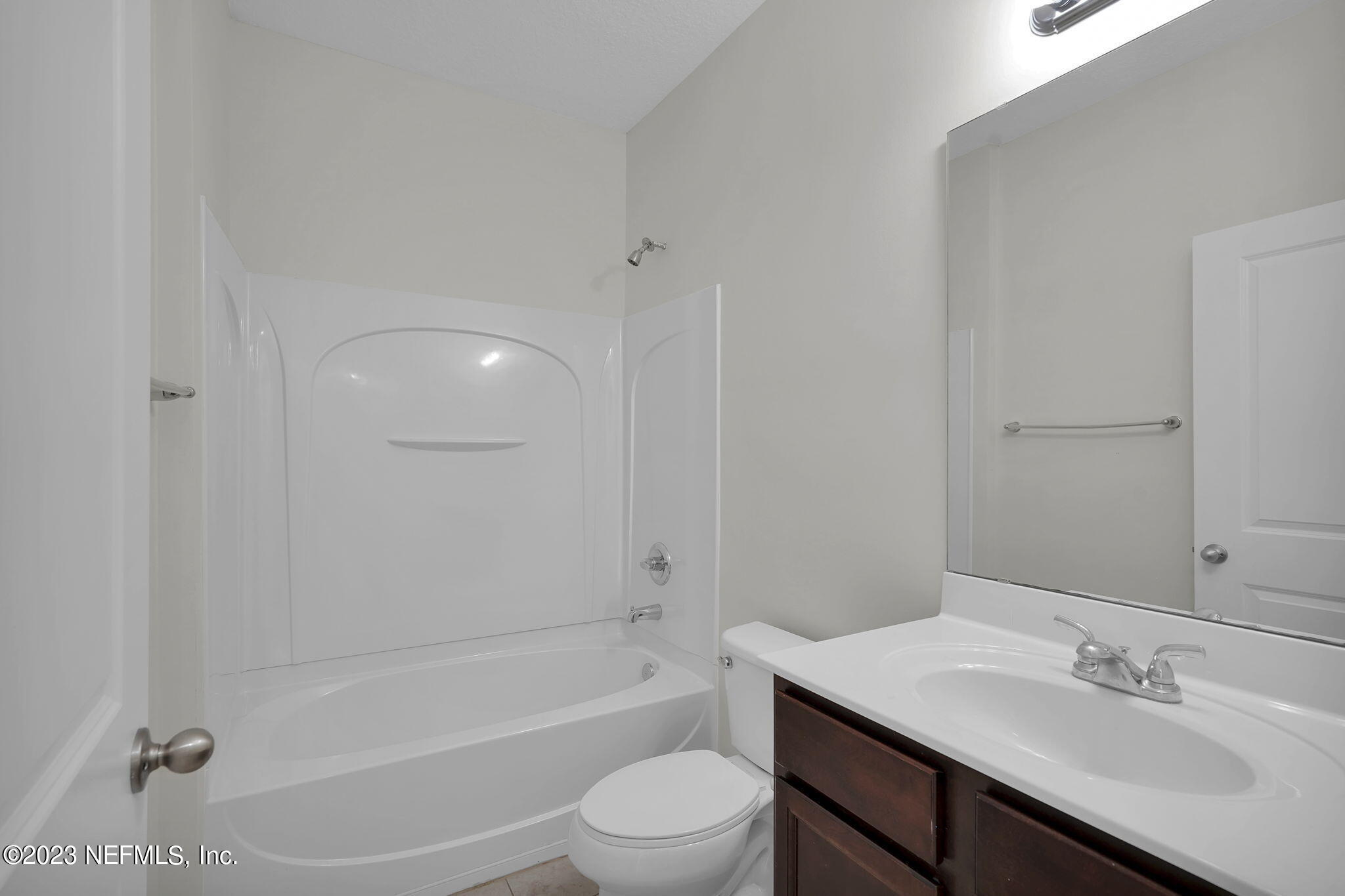 3513 Butternut Way Orange Park, FL 32065 - Photo 24 of 38 a bathroom with a sink a toilet and shower