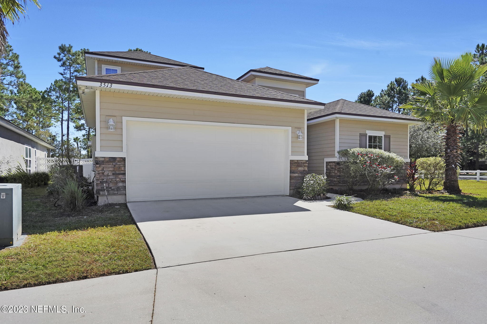 3513 Butternut Way Orange Park, FL 32065 - Photo 3 of 38 front view of house with a yard