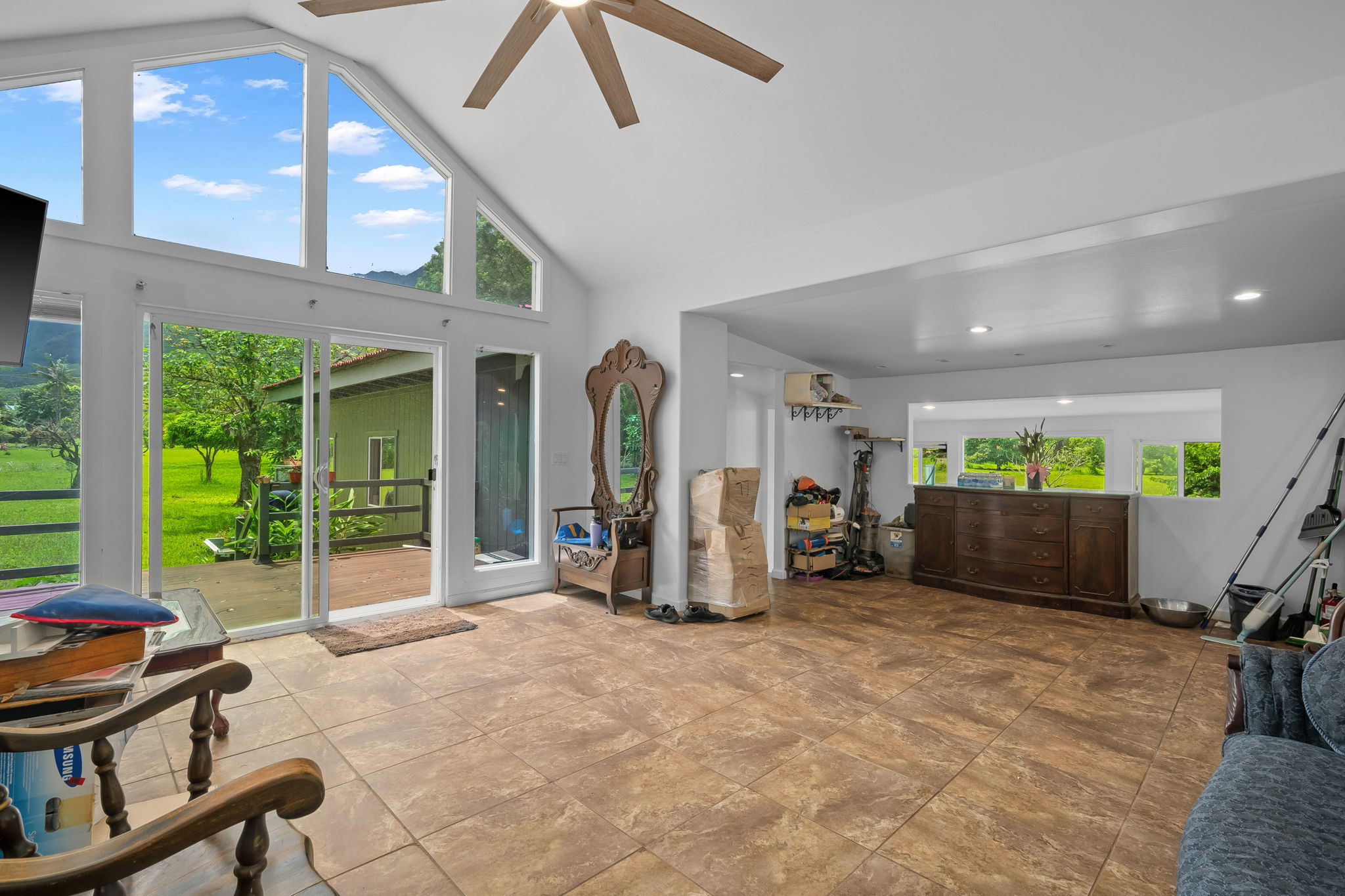 7060 Kahuna Road Kapaa, HI 96746 - Photo 1 of 30 a view of a livingroom with furniture and a window