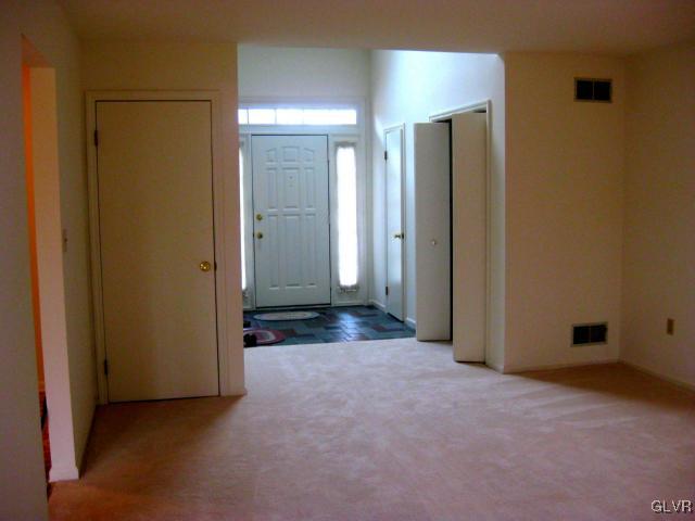1201 Butztown Road, Unit 9 Bethlehem, PA 18017 - Photo 8 of 15 an empty room with windows and closet