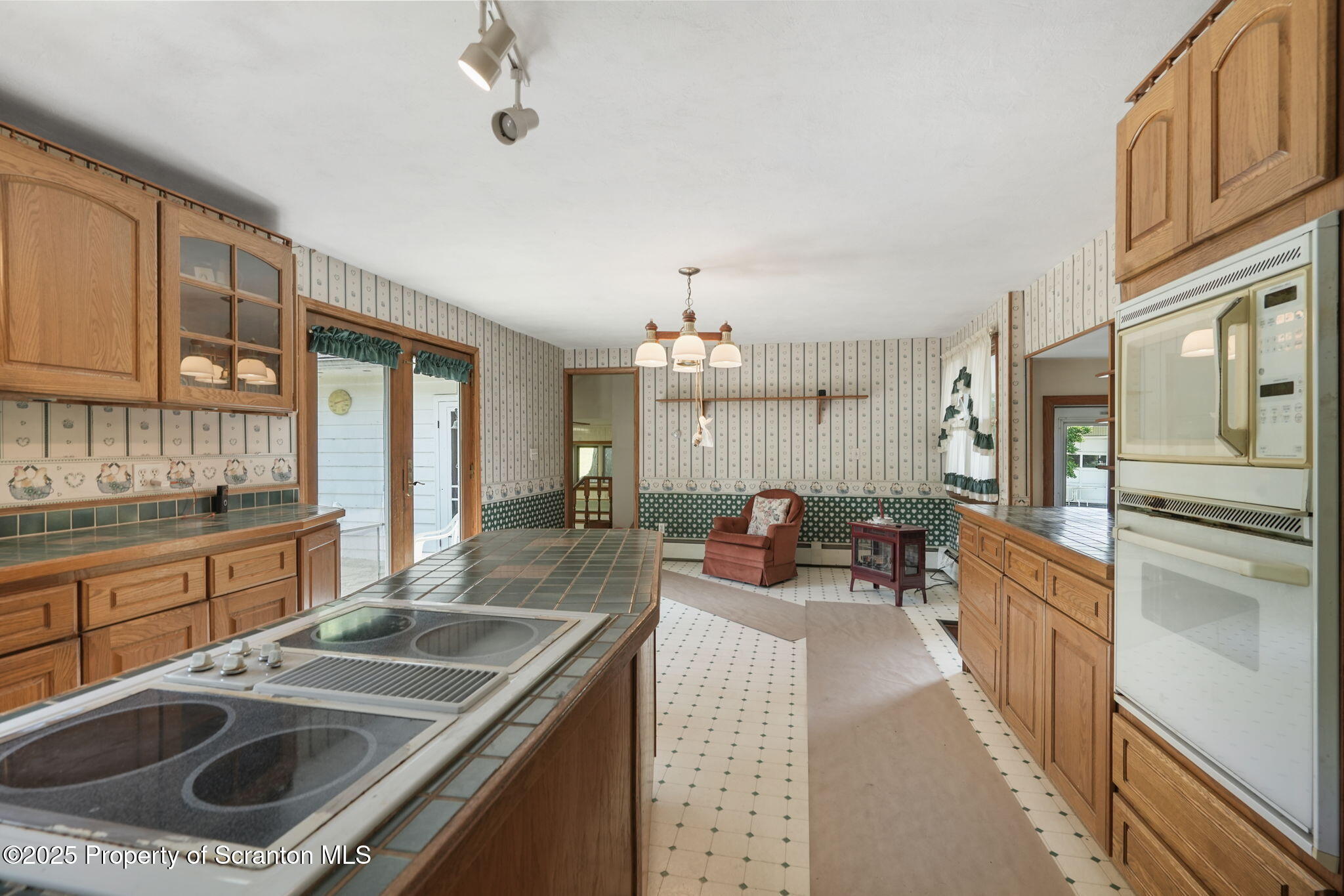 17512 Highway 267 Montrose, PA 18801 - Photo 11 of 27 a kitchen that has a sink and a stove