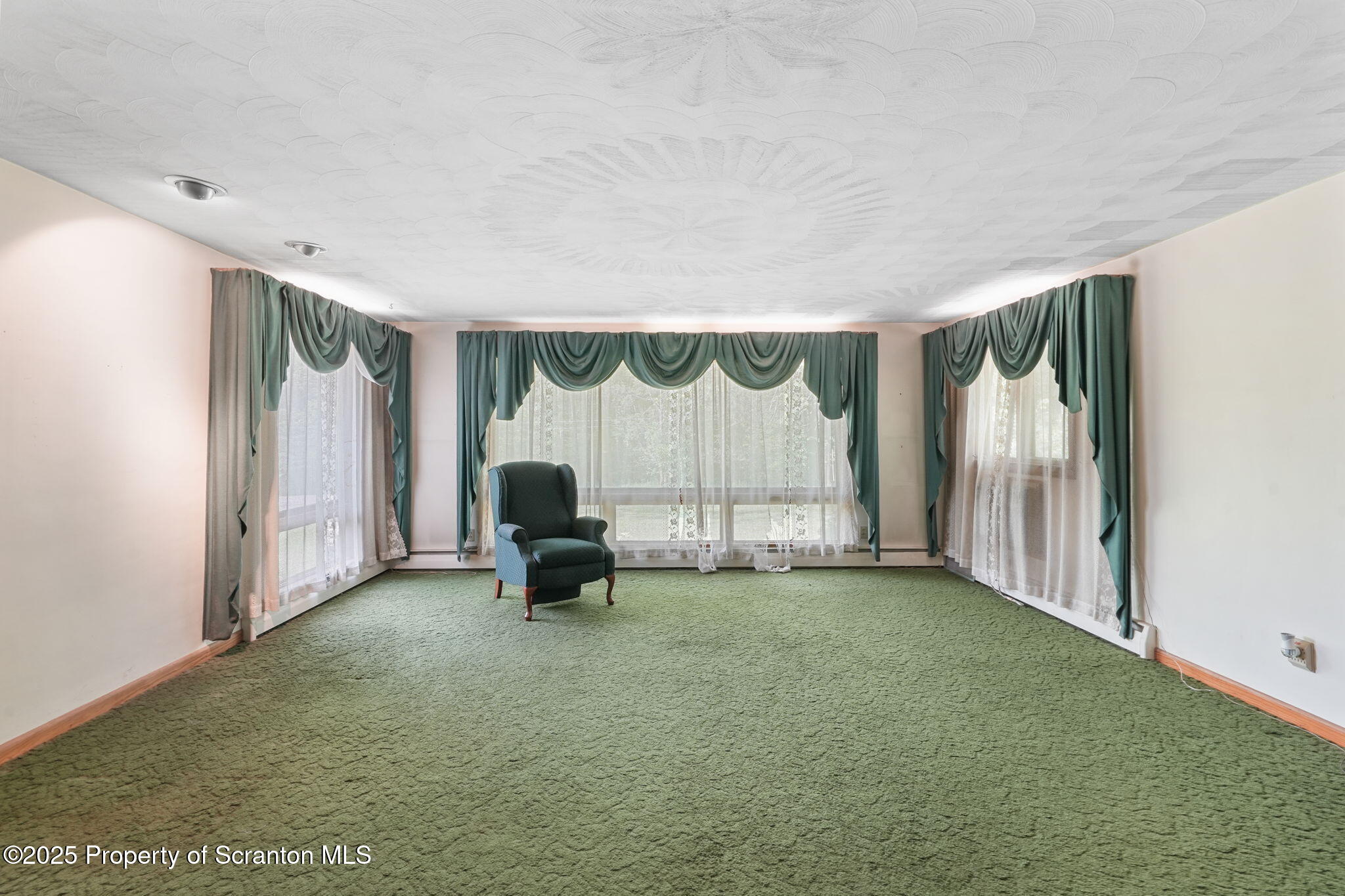 17512 Highway 267 Montrose, PA 18801 - Photo 16 of 27 a very nice looking room with a chair