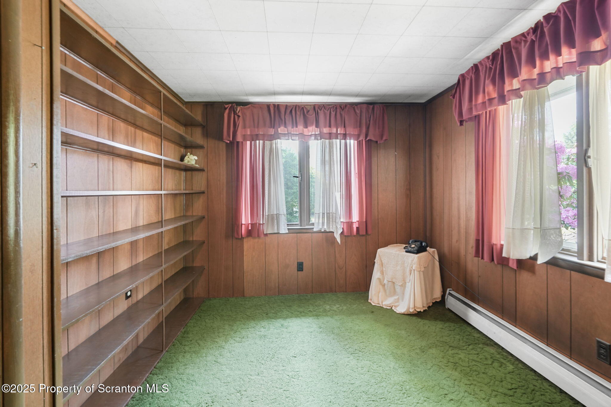 17512 Highway 267 Montrose, PA 18801 - Photo 17 of 27 a spacious bedroom with a bed and a window