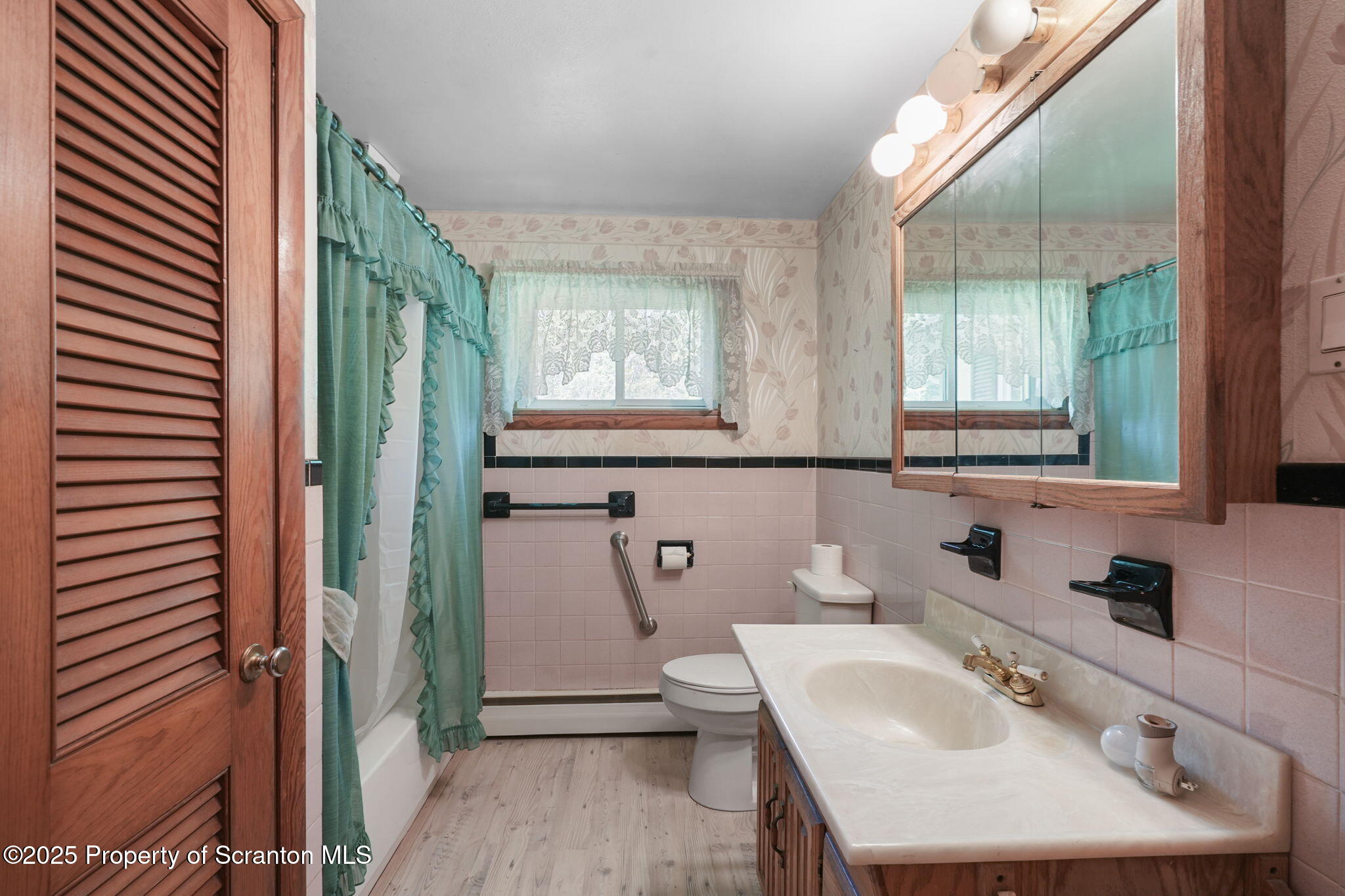 17512 Highway 267 Montrose, PA 18801 - Photo 19 of 27 a bathroom with a sink and a mirror